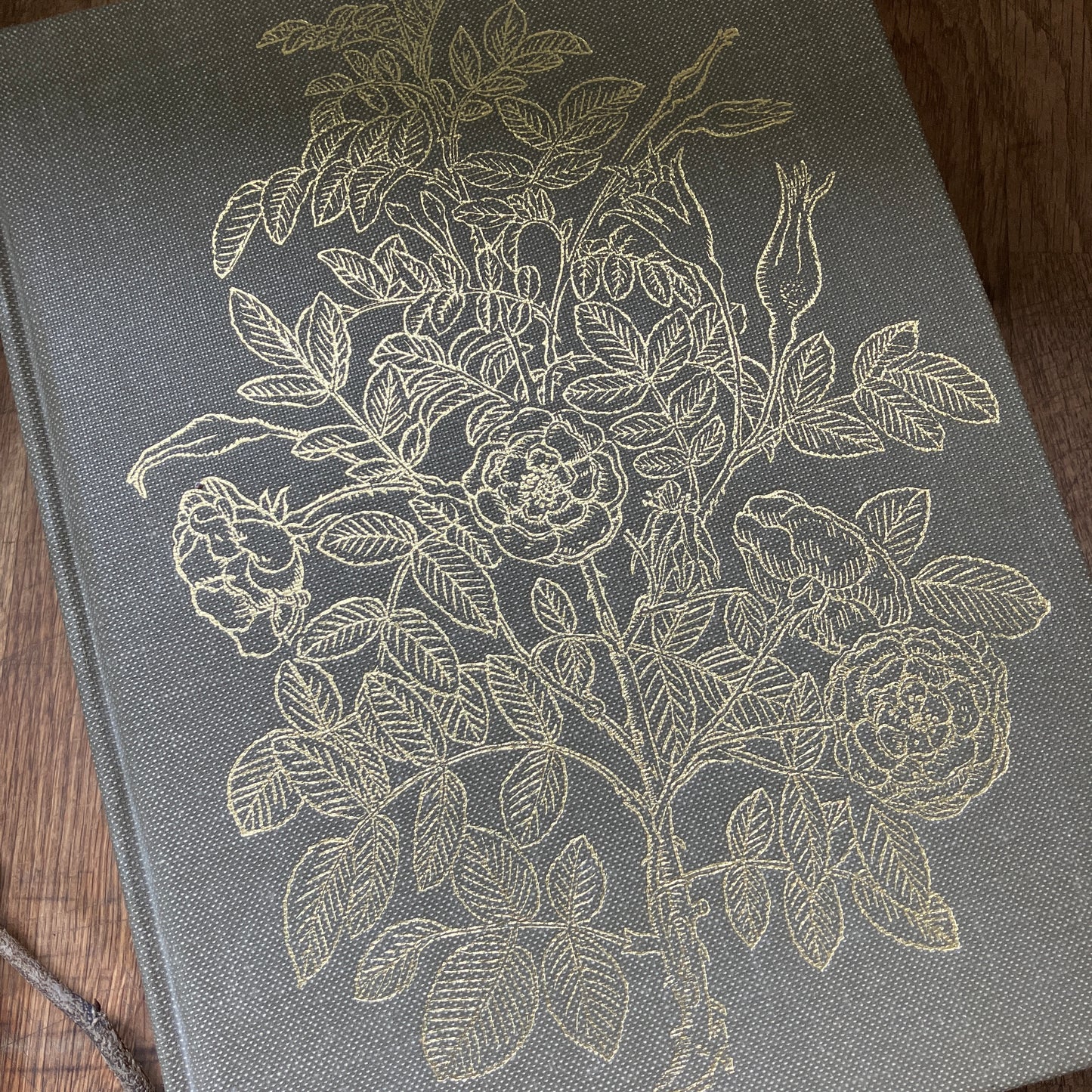 Botanical decorative coffee table book in brown and gold